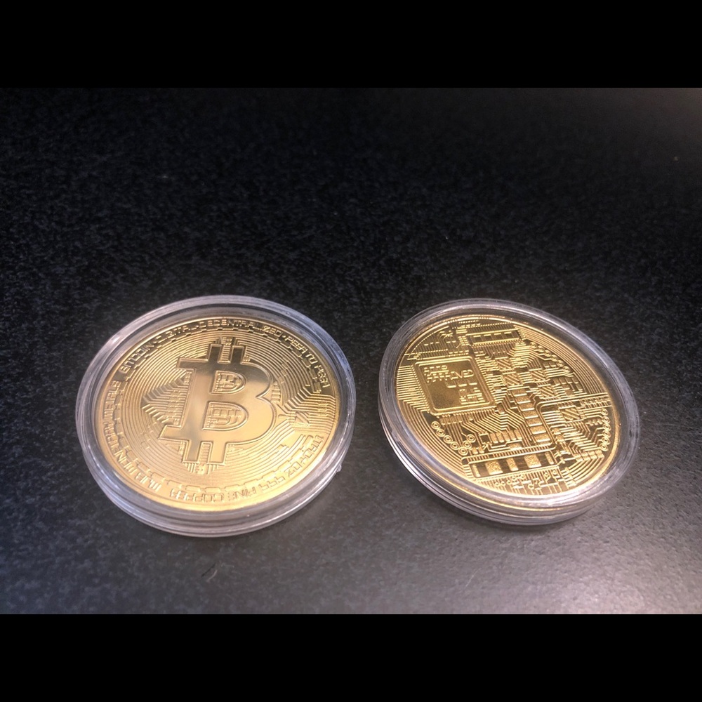 Bitcoin gold coin with case.